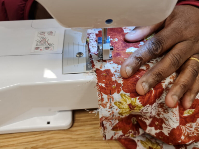 sewing at a machine